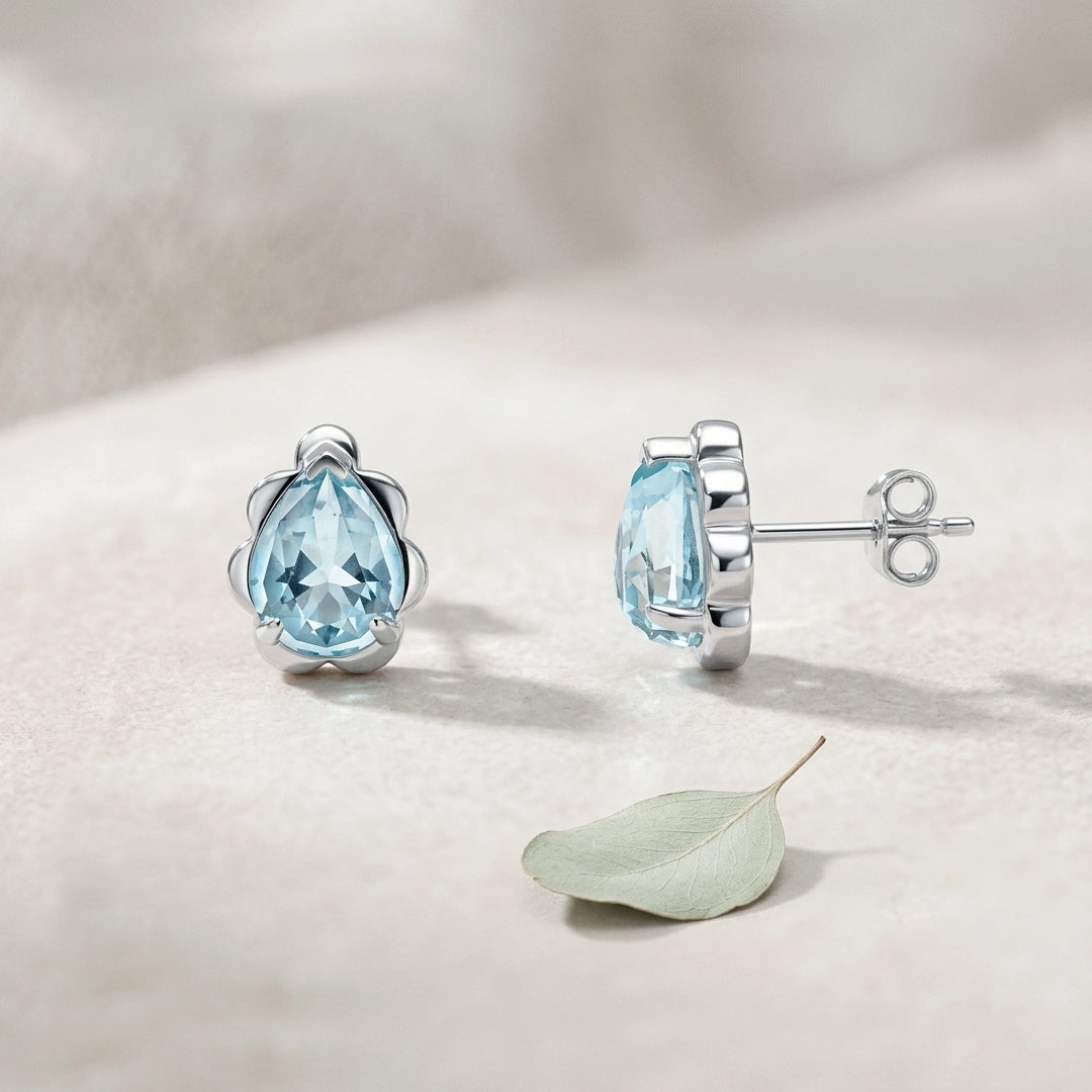9ct White Gold Fancy Cut Sky Blue Topaz Flower Bud Earrings