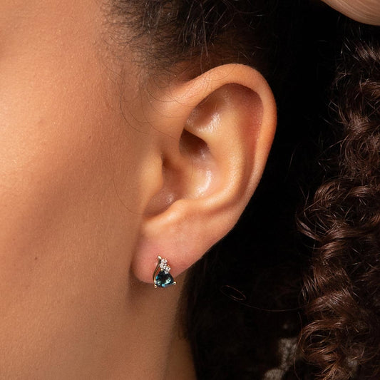 9ct Yellow Gold Trillion Shape London Blue Topaz Stud Earrings Yellow Gold 9ct Yellow Gold Trillion Shape London Blue Topaz Stud Earrings Yellow Gold