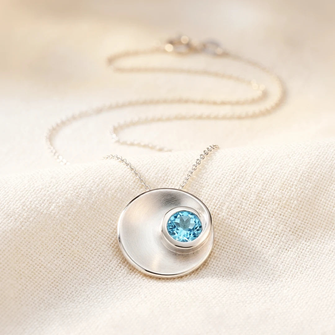 Carved Swirl Blue Topaz Sterling Silver Stud Pendant