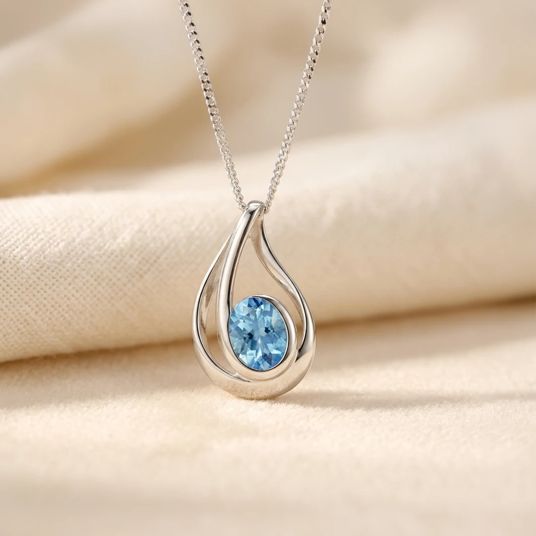 Ribbon Fold Blue Topaz Sterling Silver Pendant