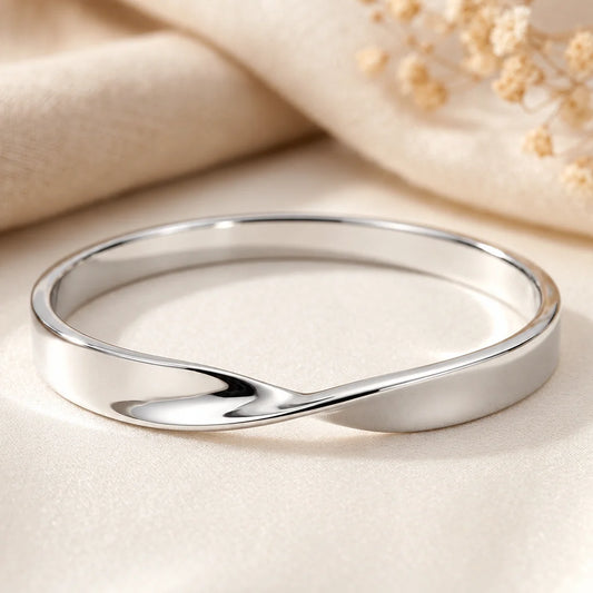 Noelle Crossover Sterling Silver Wide Bangle Noelle Crossover Sterling Silver Wide Bangle