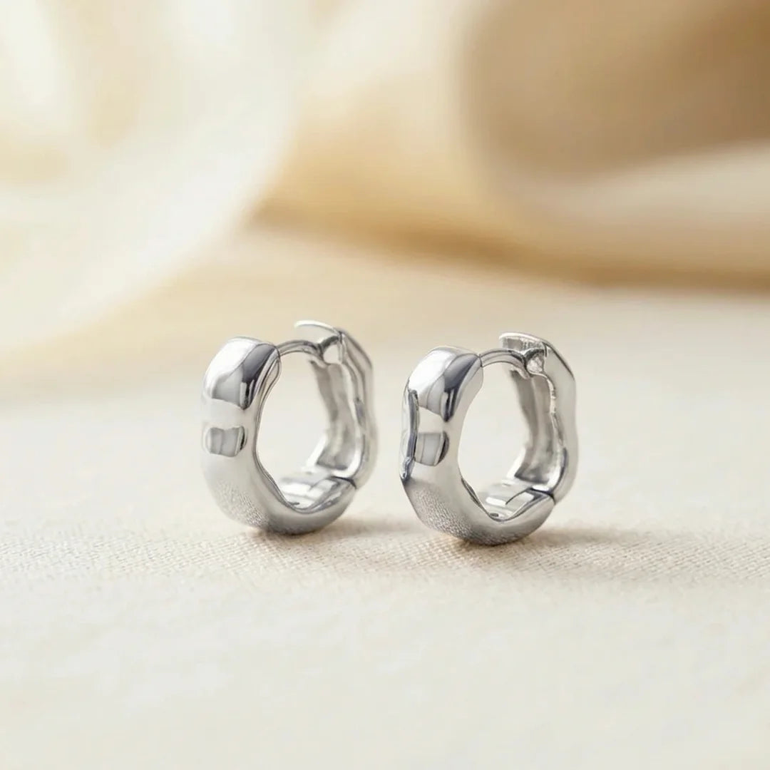 Solara Sculpted Silver Huggie Earrings