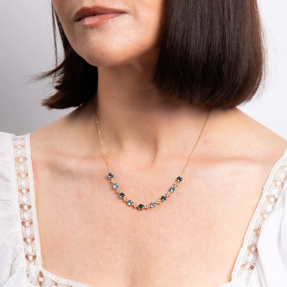 9ct Yellow Gold Blue Topaz Ornate Tennis Necklace