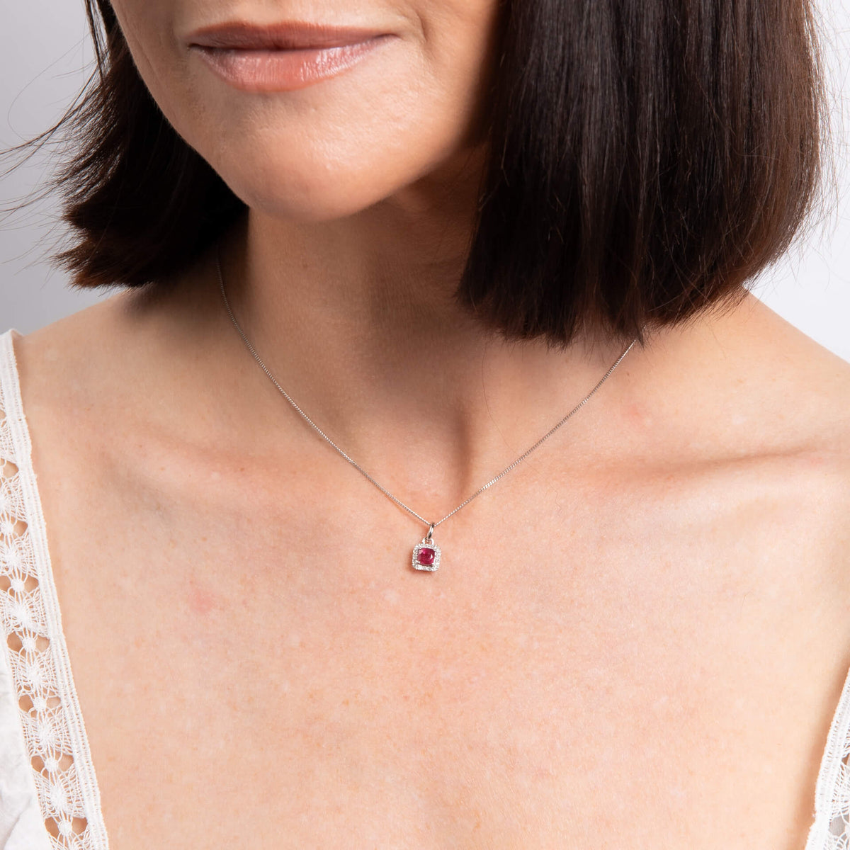 9ct White Gold Ruby and Diamond Cushion Halo Pendant