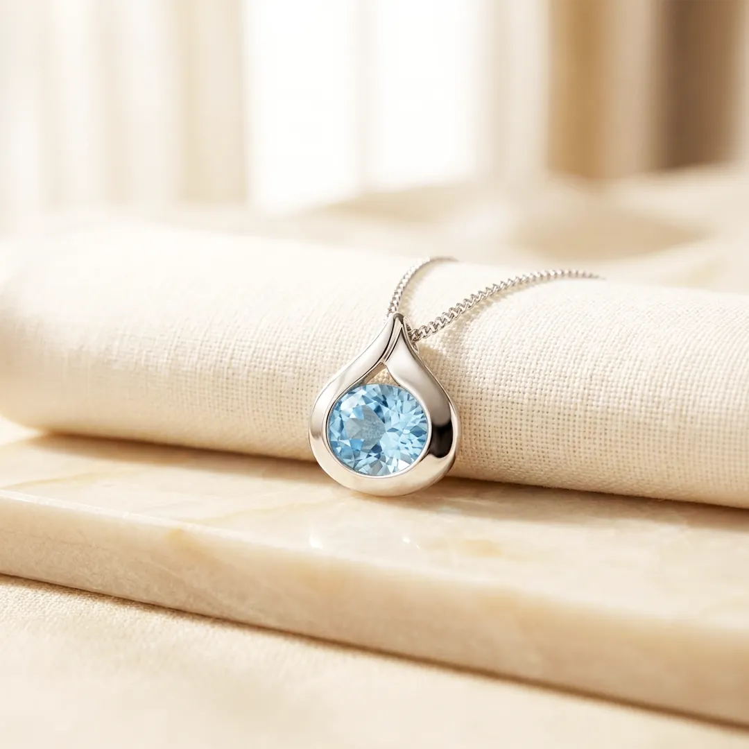 Raindrop Oval Blue Topaz Sterling Silver Stud Pendant